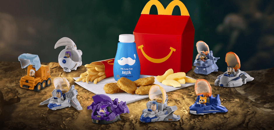 a group of toys and a fast food box of toys mcdonald
