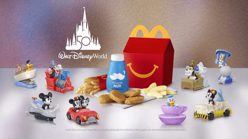 a group of MCDONALD toys on a table
